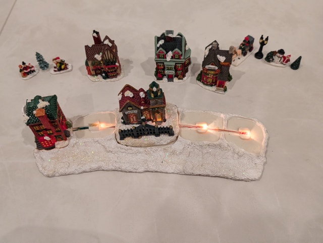 Lighted Christmas Village with Characters and Accessories - photo 4