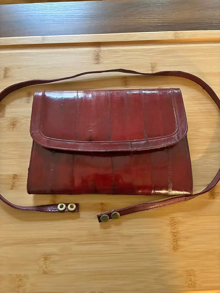 Burgundy eel skin handbag thumbnail