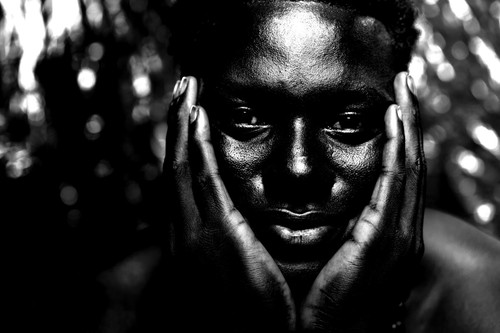 Uncle MoMo's Piercing Set of Eyes Photo Print on Aluminum