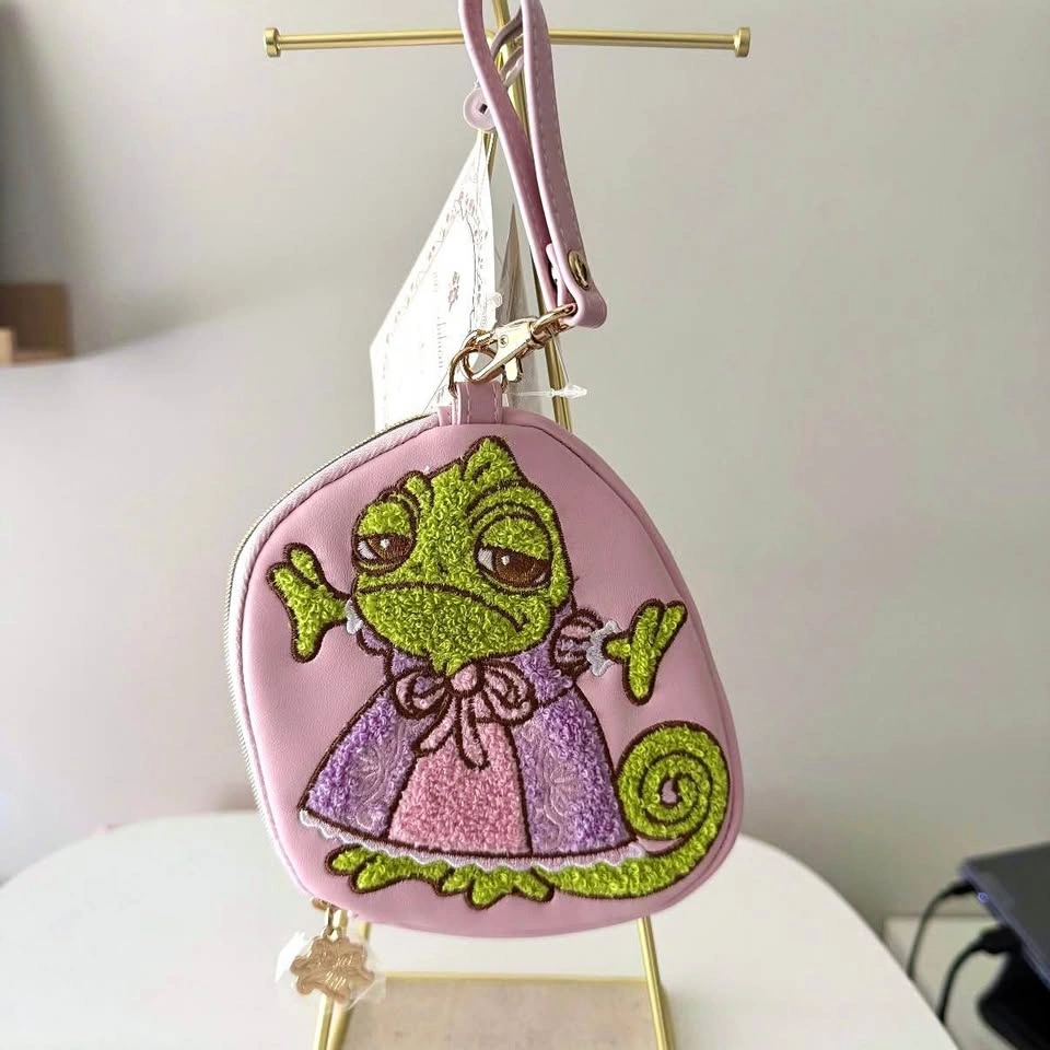 NWT Tangled Rapunzel Pascal Disney Princess Bag Charm