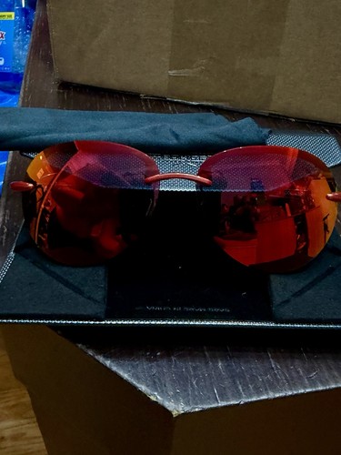 Police SPL 302G Women’s Rimless Oval Sunglasses Red Mirrored