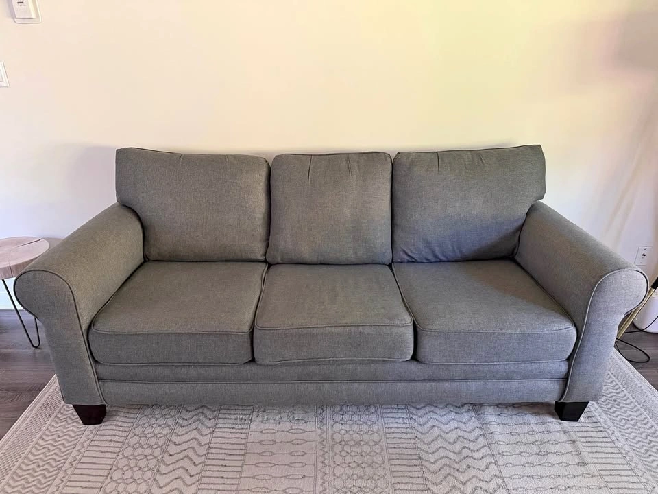 Modern 3-seat grey sofa in excellent condition