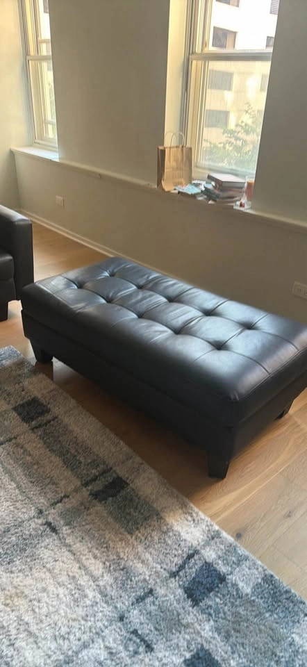 MOVING: Black Leather Couch w/ Ottoman - photo 2