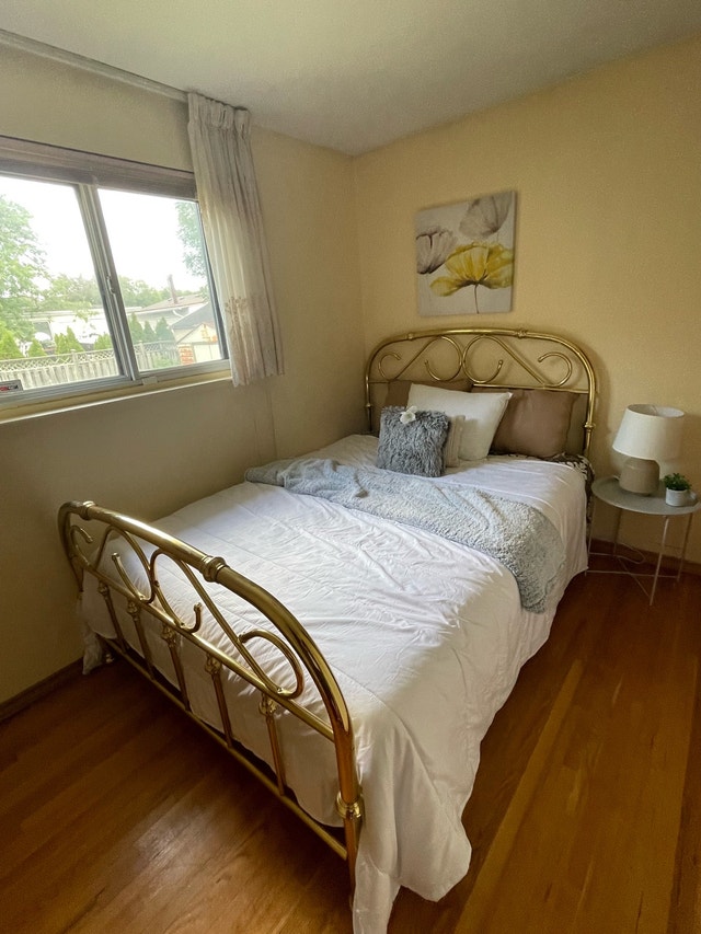 Brass bed with queen mattress and box spring