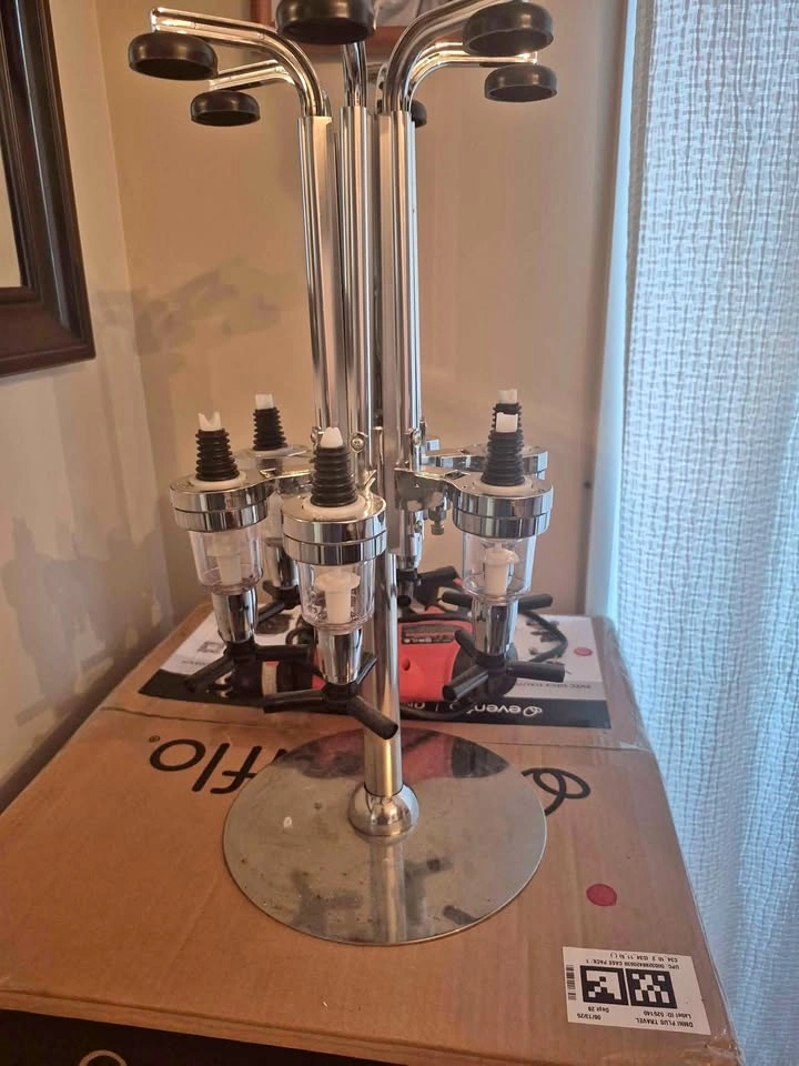 Spinning alcohol dispenser