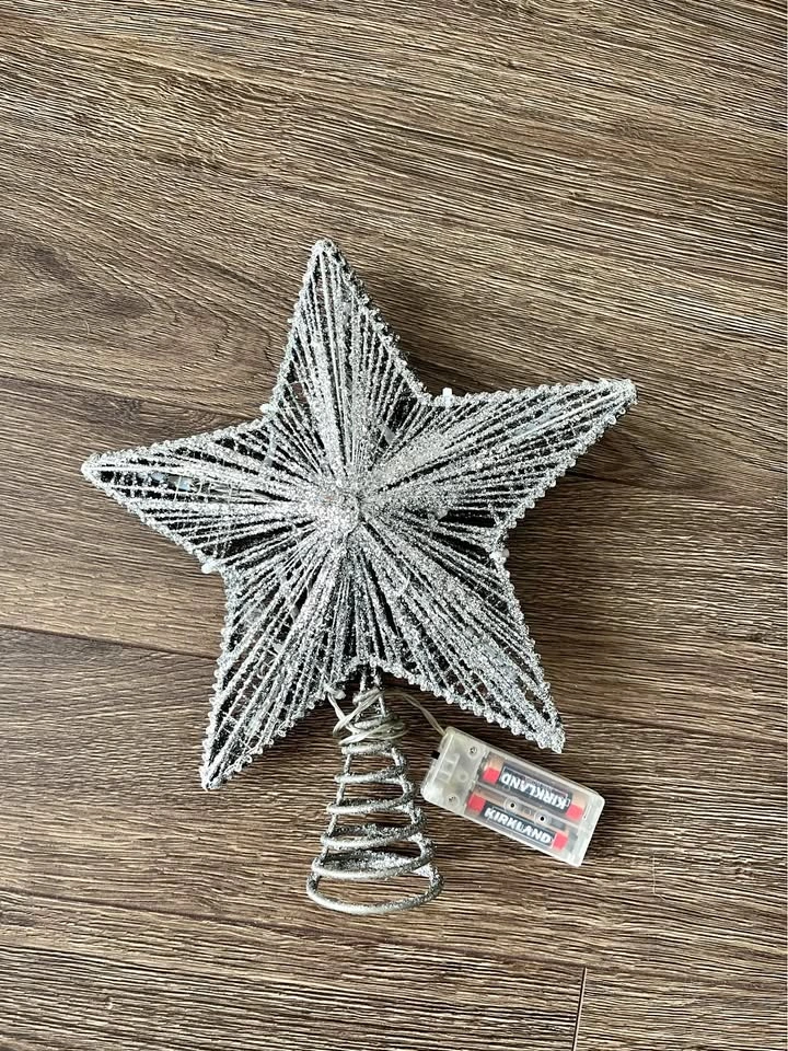 Silver star Christmas tree topper with lights