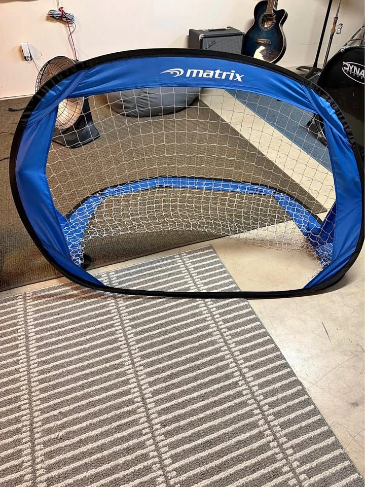 Matrix Pop Up Soccer Goal Shin Guards and Soccer Cleats