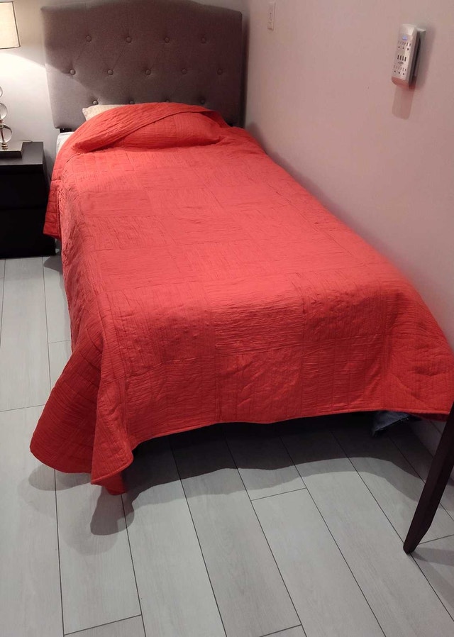 Sunburst orange quilted bedspread twin