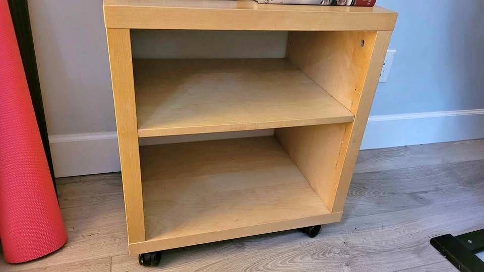 Two ikea shelving units on wheels