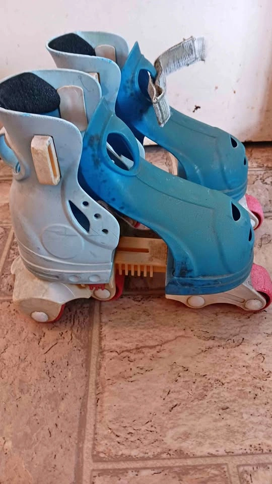 Vintage Fisher-Price Little People Adjustable Roller Skates