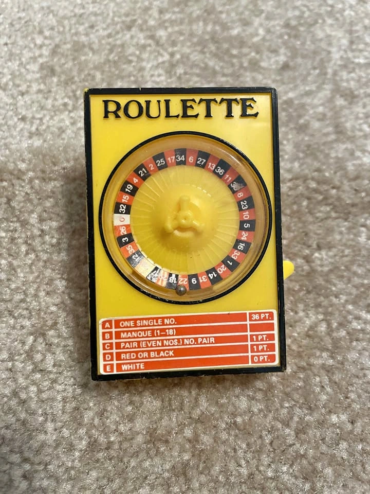 Vintage Handheld Gambling Games - Roulette and Jackpot