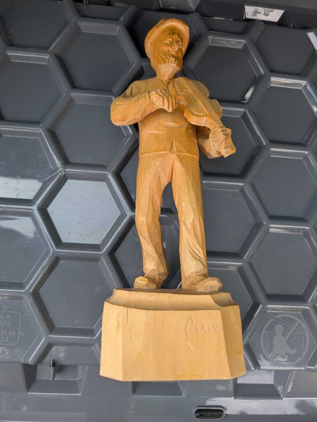 Wood carving by artist Caron