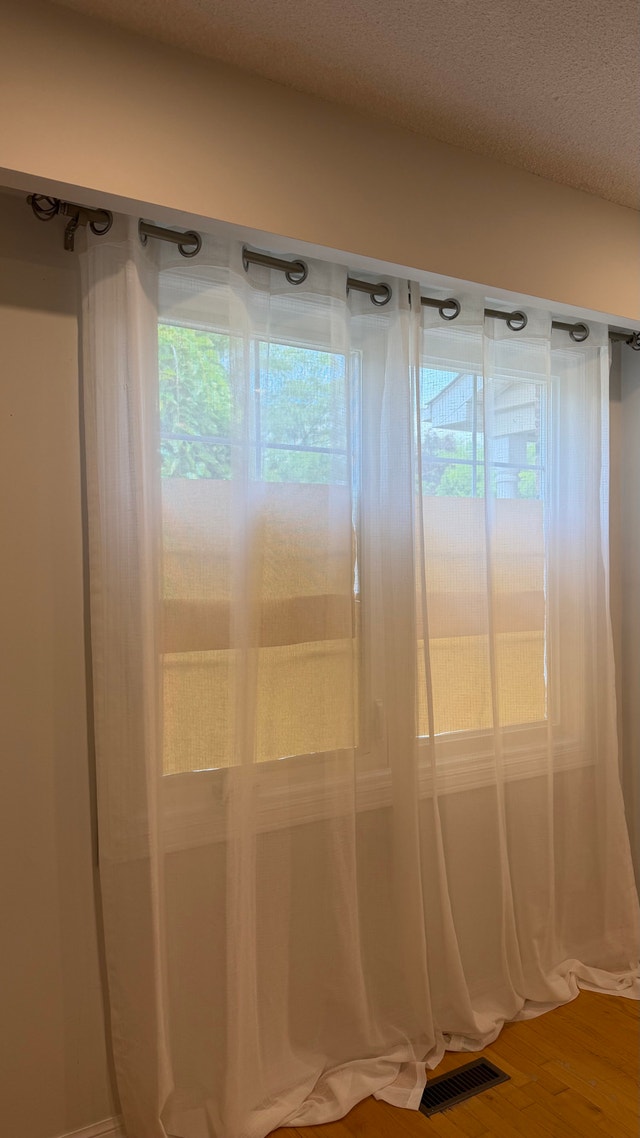 White Sheer Curtains with Decorative Rod