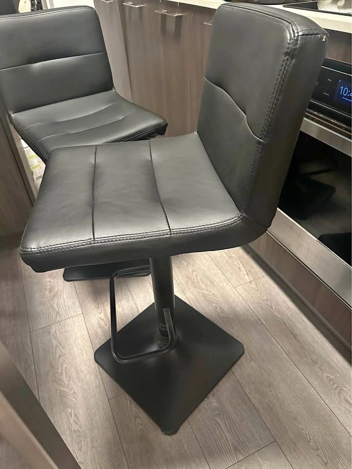 Pair of Black Faux Leather Adjustable Bar Stools