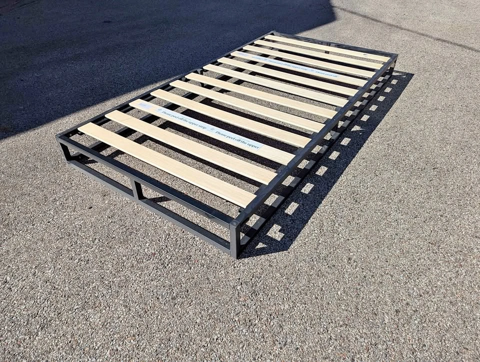 Black metal platform bed