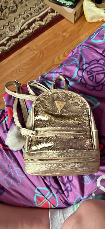 Golden mini backpack