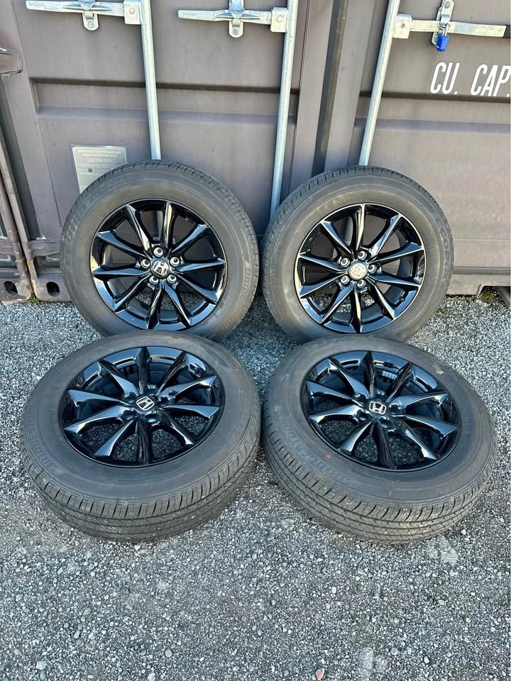 Set of OEM 18” Honda CRV Rims on Bridgestone All Season Tires