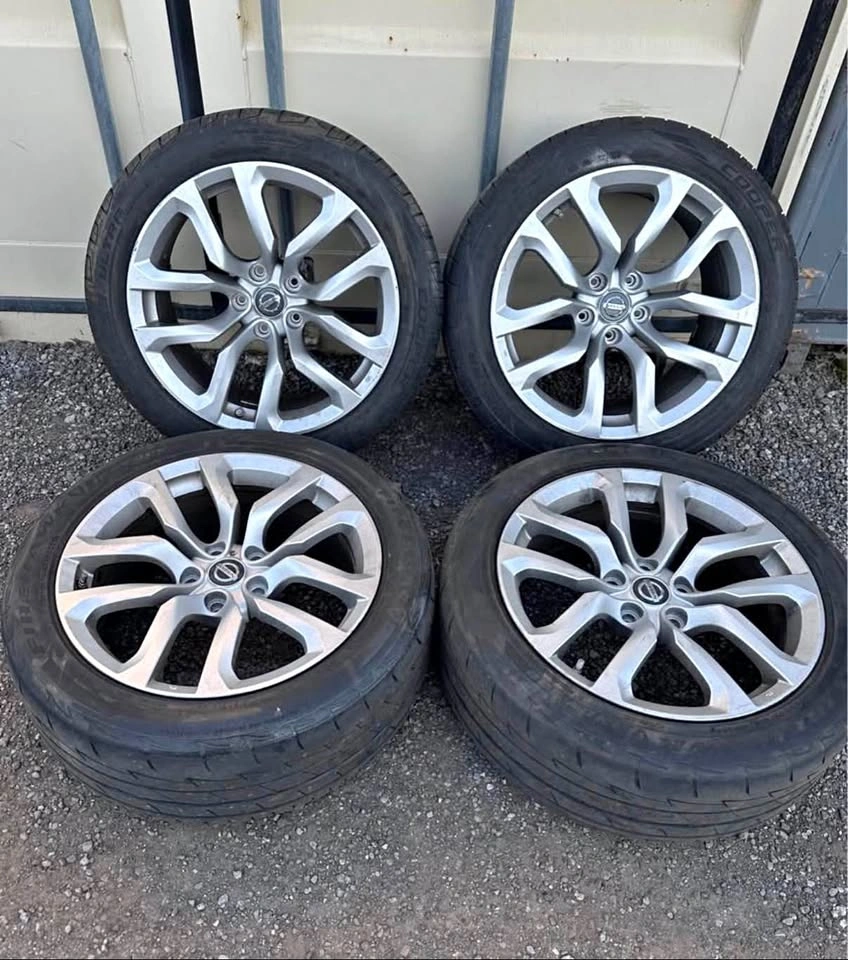 Set of OEM Staggered 18” Nissan 370Z Rims on Firestone Tires