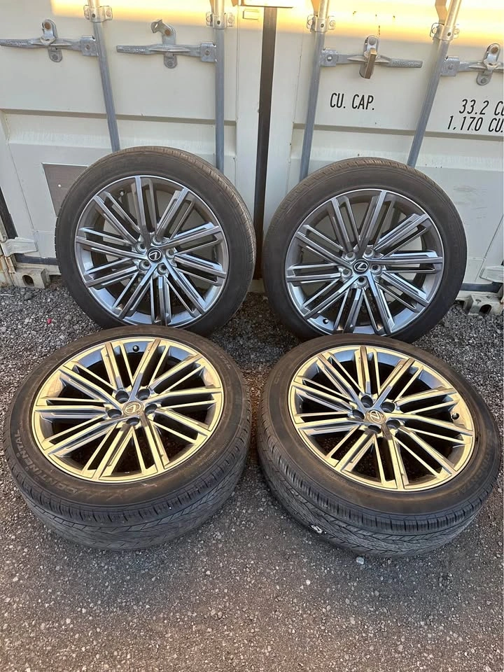 Set of OEM 22” Lexus TX350 Executive Rims on Continental Tires