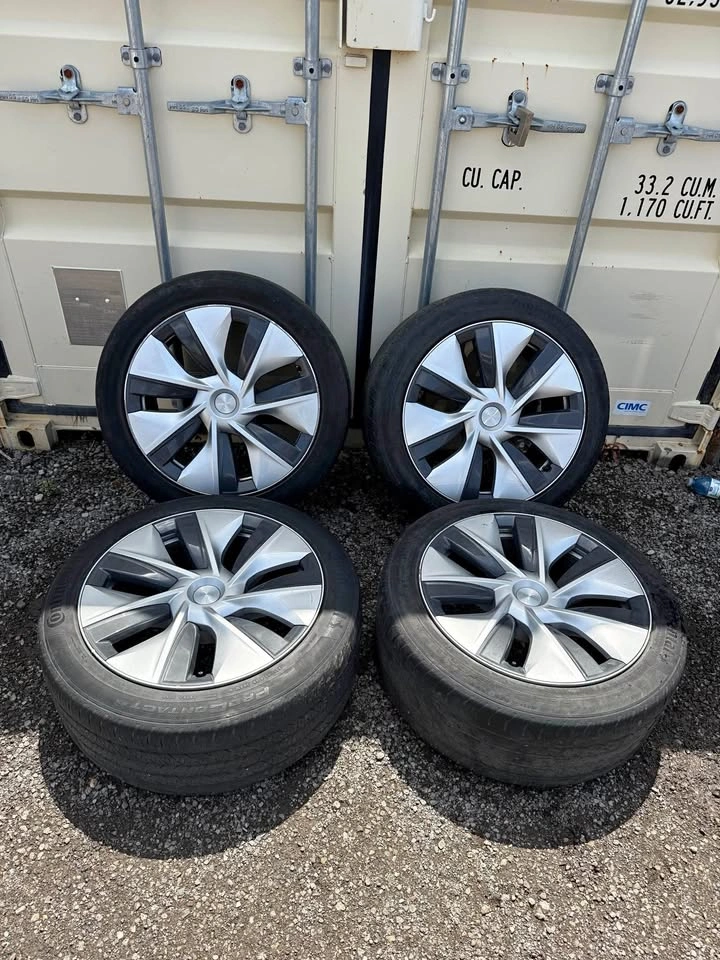 Set of OEM 19” Tesla Model Y Gemini Rims on Continental Tires