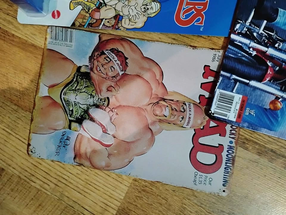 Stone Cold action figure, tin signs, and 90s belts - photo 3