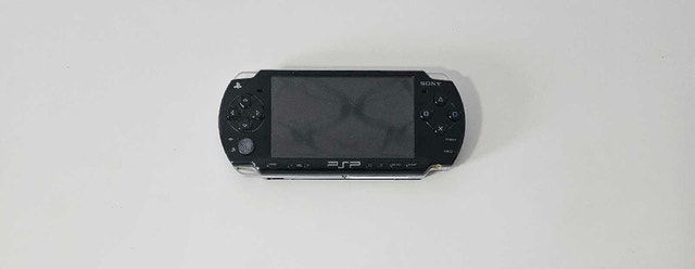 Sony PSP Console + 4 Games