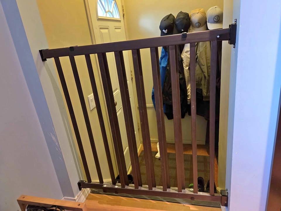Espresso brown wood doorway adjustable baby gate