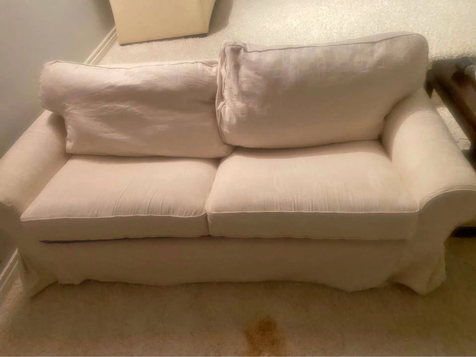 White Slipcovered Loveseat