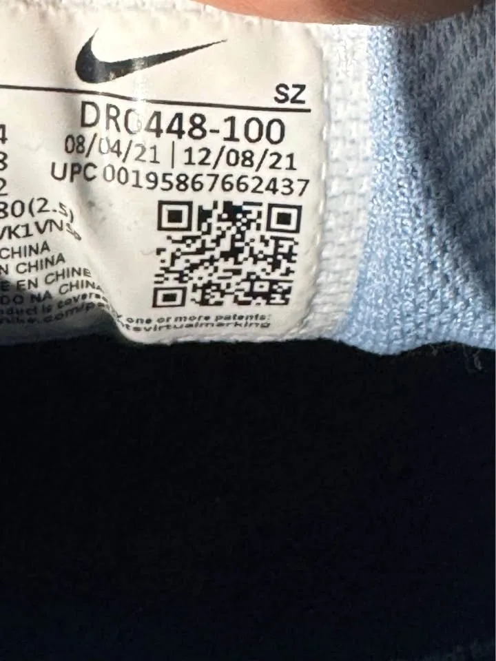 White and blue used nike shoes size 10 image indicator(9)