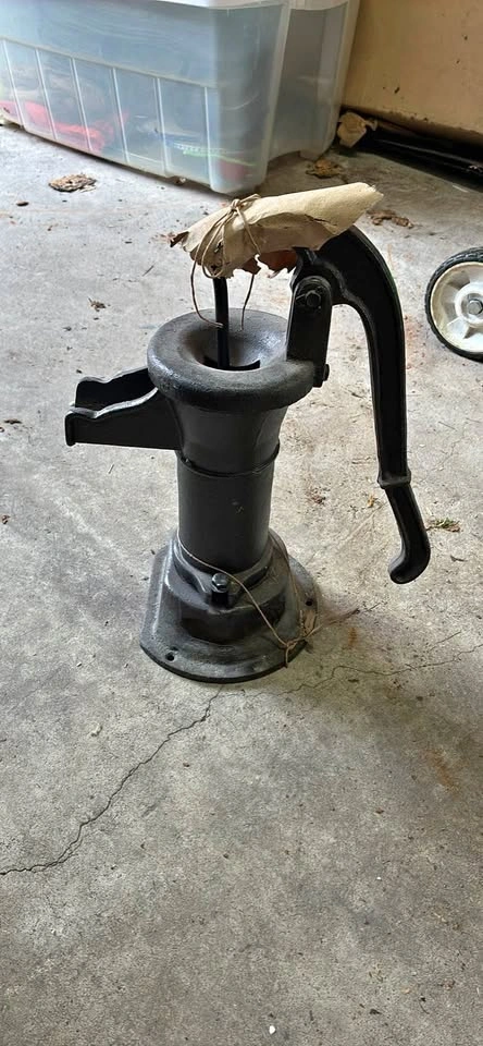 vintage or antique cast iron pitcher pump