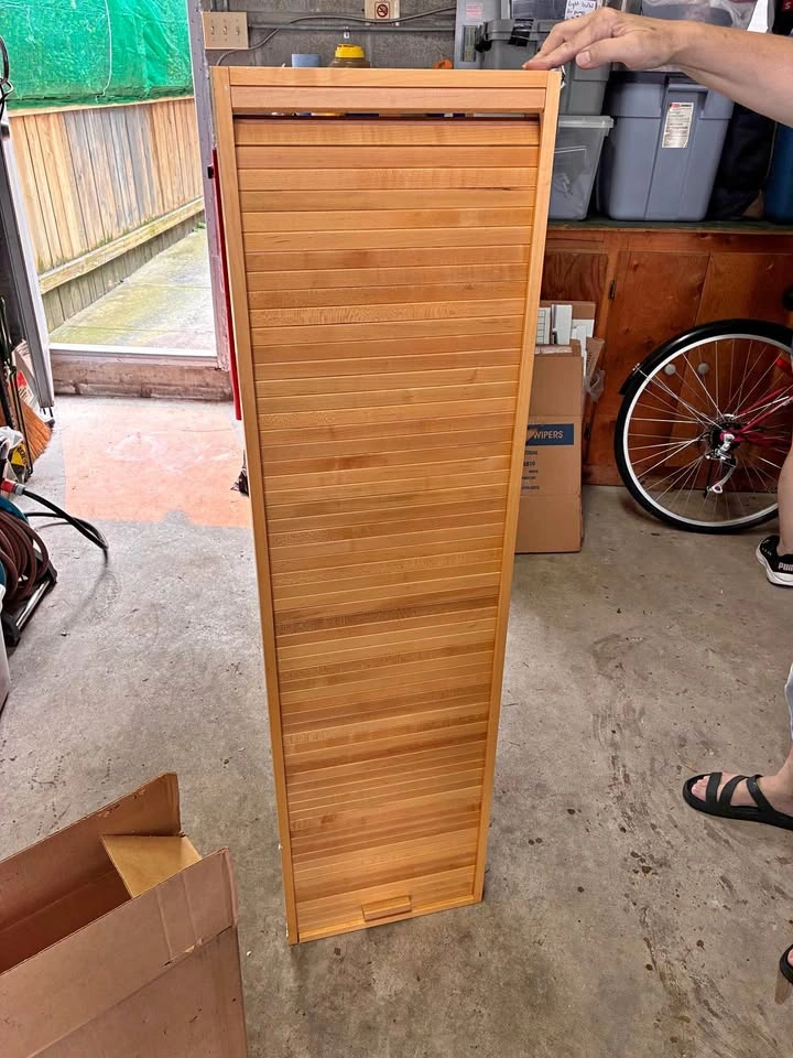 Wall mounted hidden ironing board