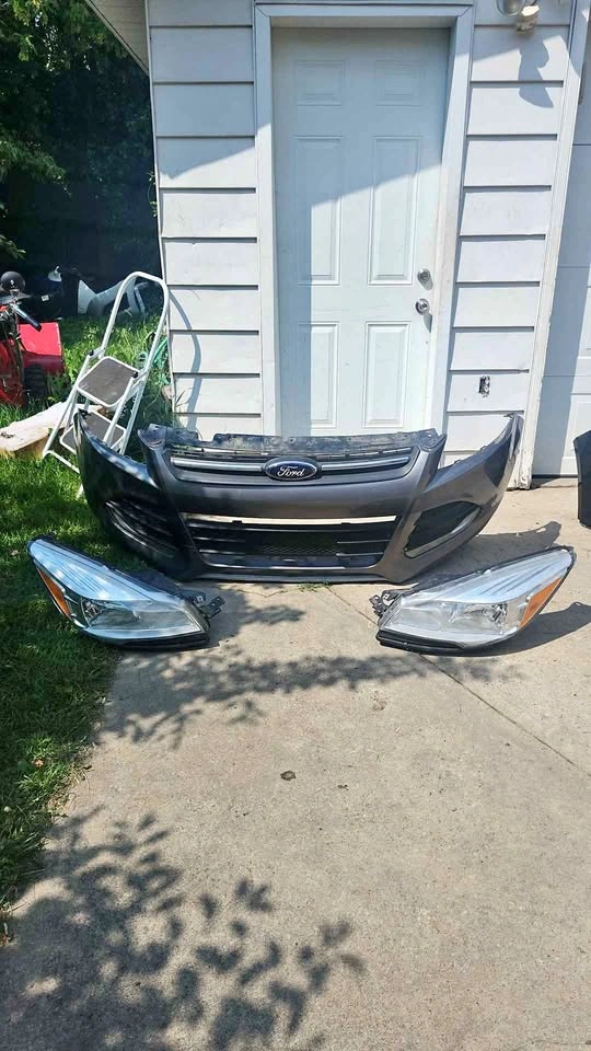 Ford escape front bumper with headlights 2013 to 2016