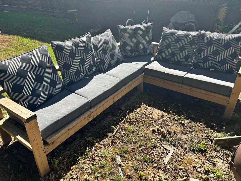 Outdoor wooden patio couch set with cushions