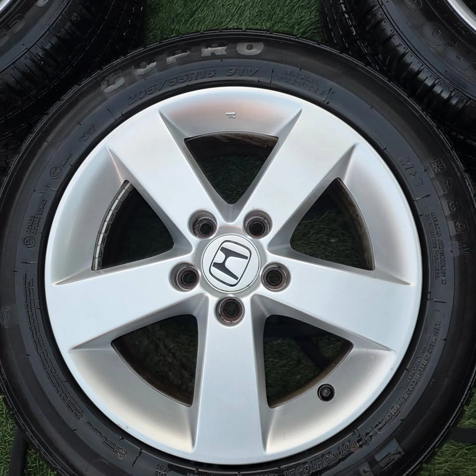 205/55/16 All Season Tires 80% Tread with Honda Alloy Rims - photo 3
