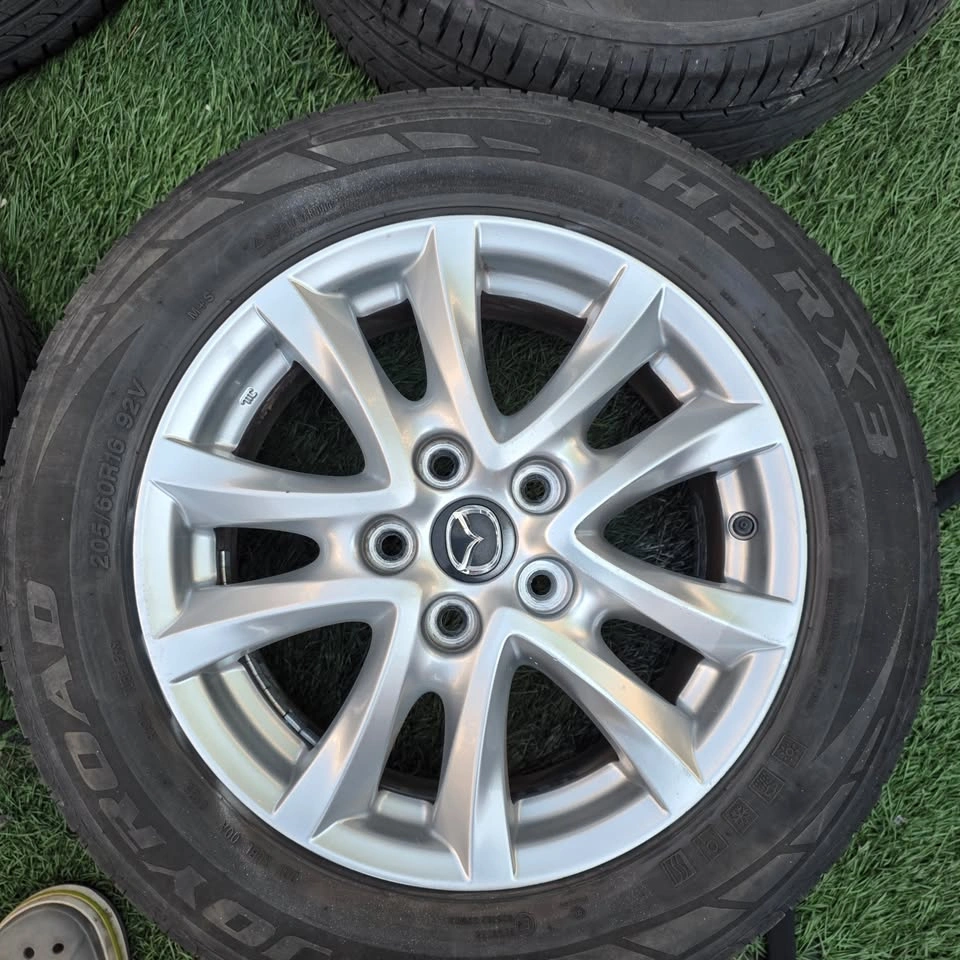 205/60/16 All Season Tires with Mazda OEM Alloy Rims 5x114.3 - photo 2
