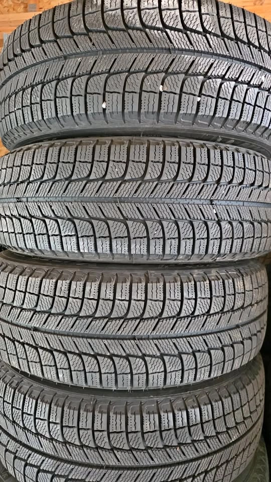 215/60/16 Michelin winter tires 90% tread with Steel rims 5x114.