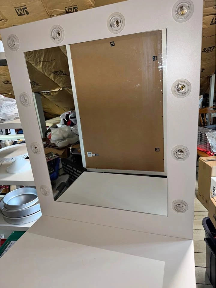 White Vanity with Mirror and Lightbulbs