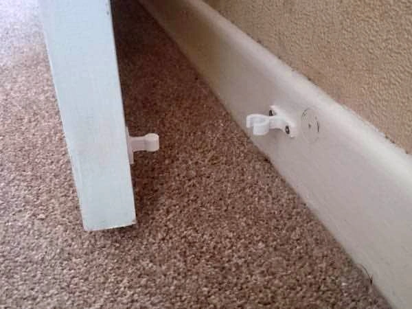 White Plastic Door Holder Catch