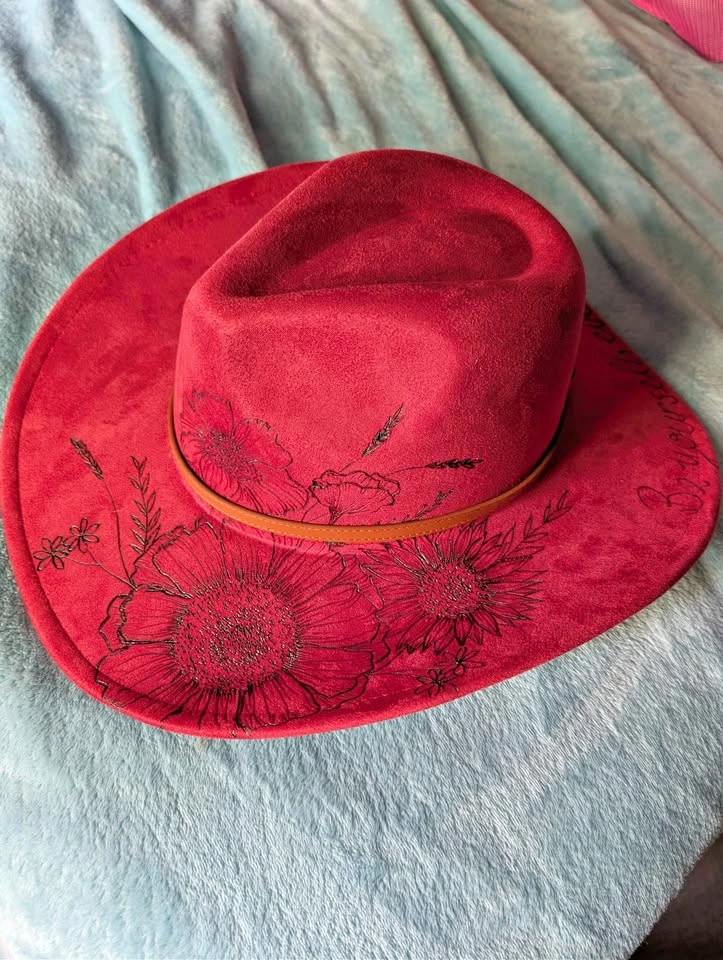 Red cowboy hat with burn design