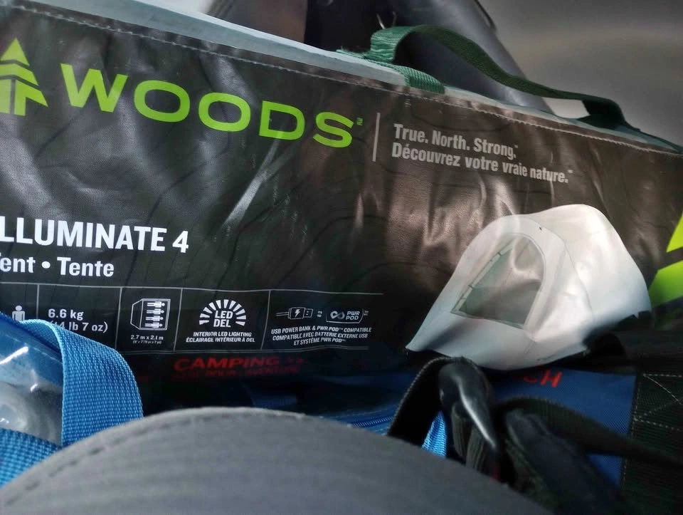 New never opened woods 4 man illuminate 4 tent