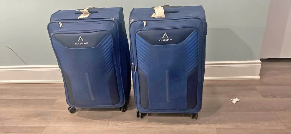 Set of 2 Aristocrat Softside Spinner Suitcases (25kg each)