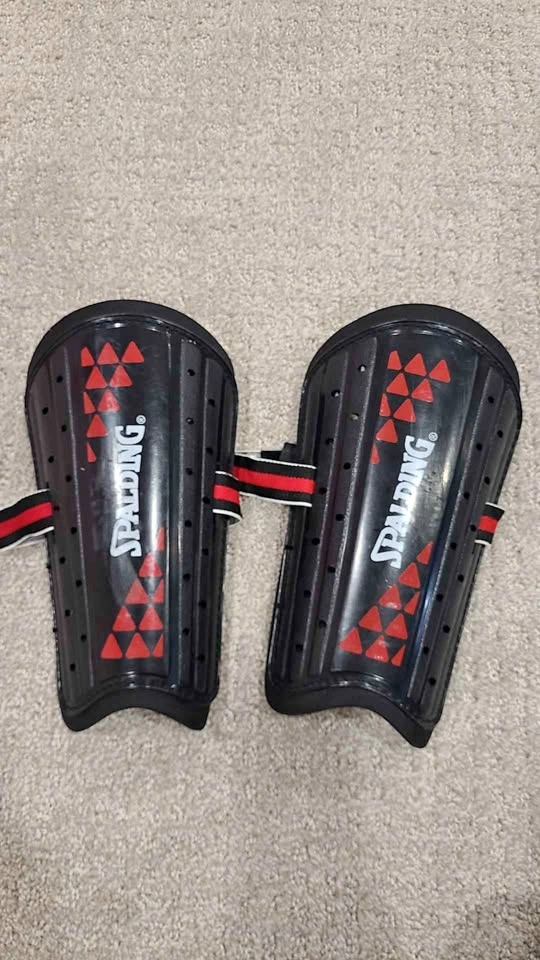 Uses Spalding Shin Guards