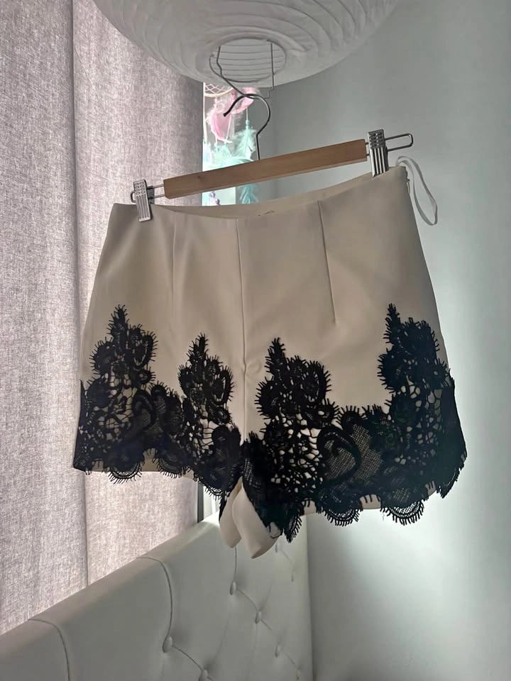 Cream High-Waisted Shorts with Black Lace Trim