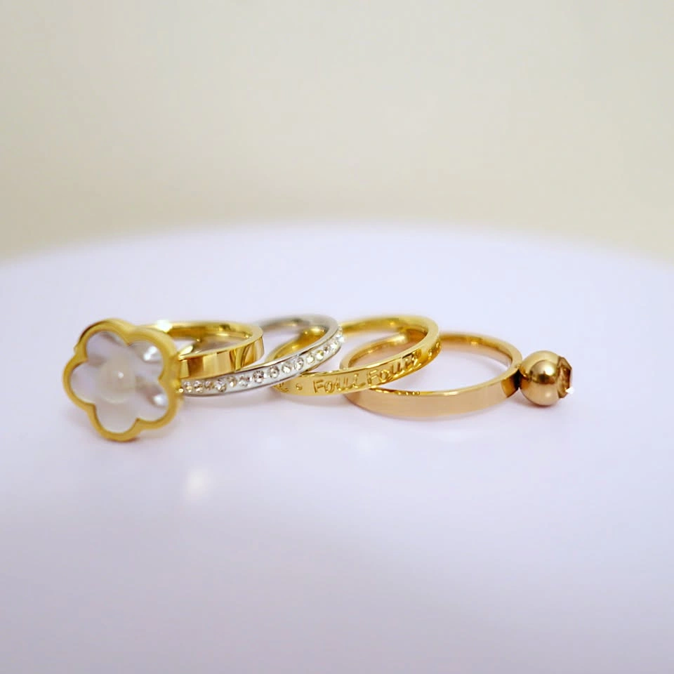 New Genuine Folli Follie 4-piece Size 7 Stackable Rings - photo 4