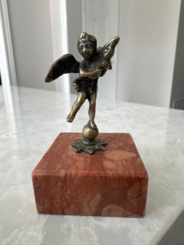Vintage neoclassical style brass winged cherub (putto) figurine