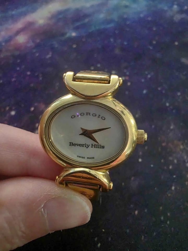 Giorgio Beverly Hills gold tone women's bangle watch