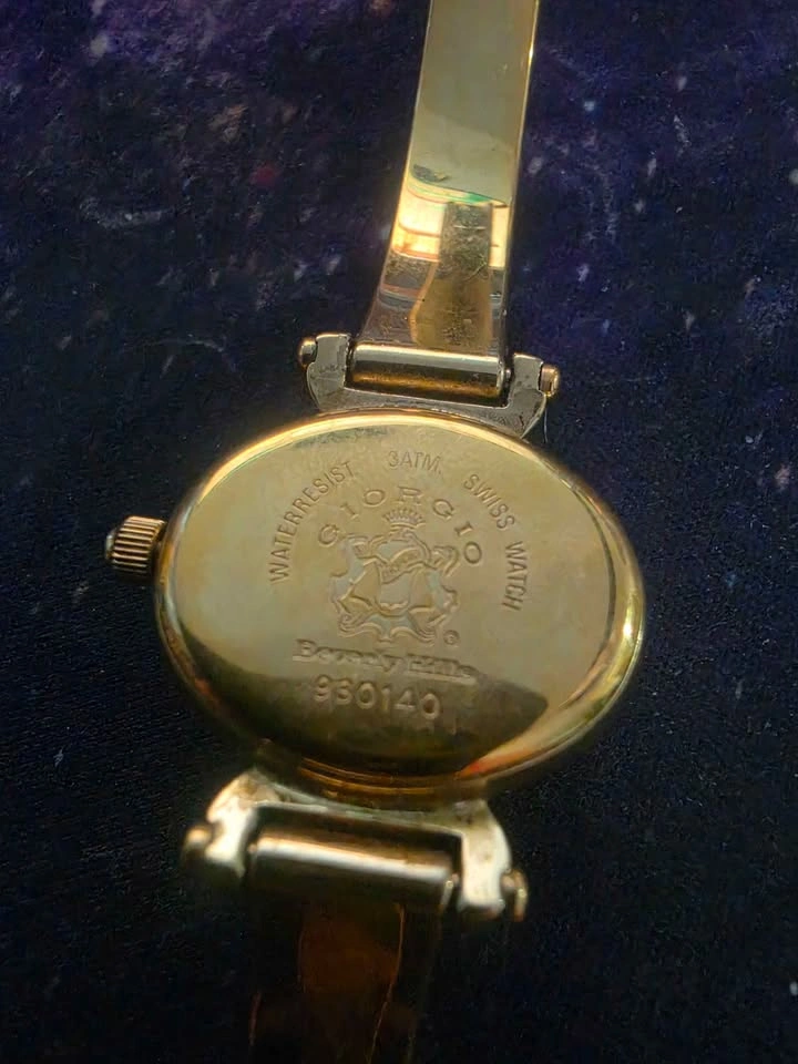 Giorgio Beverly Hills gold tone women's bangle watch - photo 2