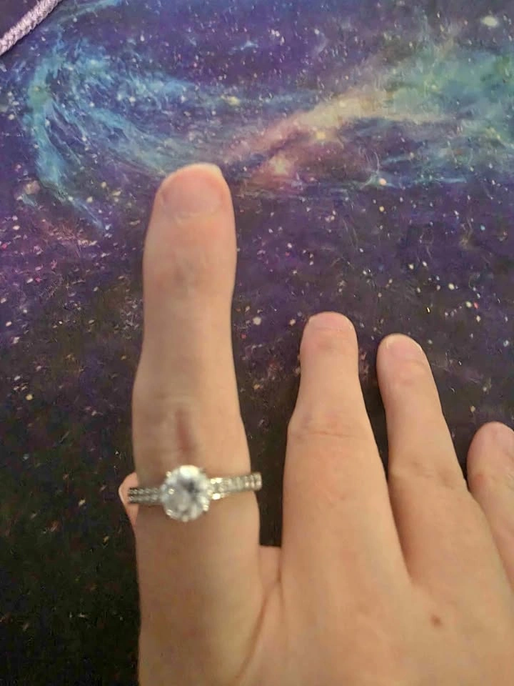 Silver-tone ring with clear stones