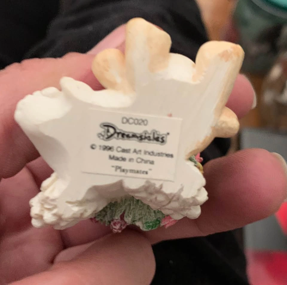 Child Holding Teddy Mini Figurine - photo 2