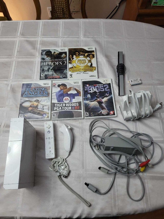 nintendo wii console with games